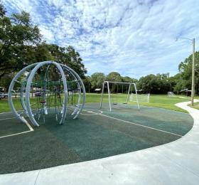 Eastwood Park - Come play at our soccer inspired park, complete with netted goals. Leashed pets allowed, swing set, covered picnic tables and playground. Photo